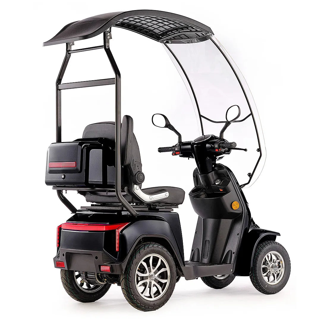 Scooter eléctrico con cabina de techo para proteger al usuario de las inclemencias climáticas de Dortomedical