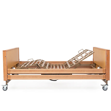 Vista lateral de la cama articulada con elevación de cuatro planos articulados para ajustar la posición al usuario dortomedical