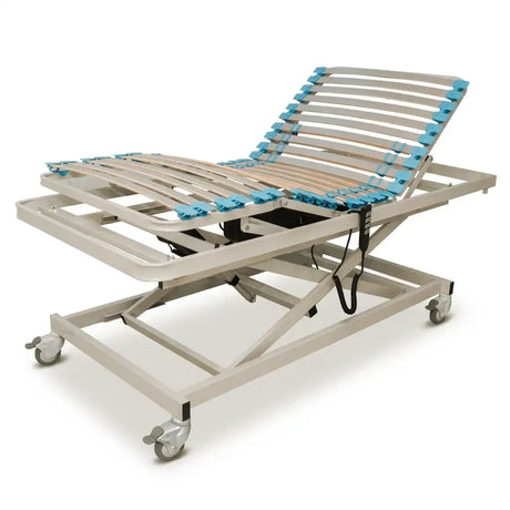 Cama para enfermos con elevacion regulable hasta 93 cm que facilita una transferencia segura dortomedical