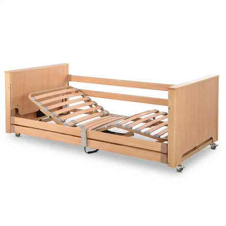 Cama articulada con rango de elevación hasta 61 cm para facilitar las transferencias del paciente dortomedical