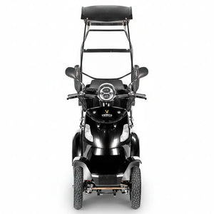 Vista frontal de scooter con techo mostrando el sistema de luces completo y espejos retrovisores dortomedical