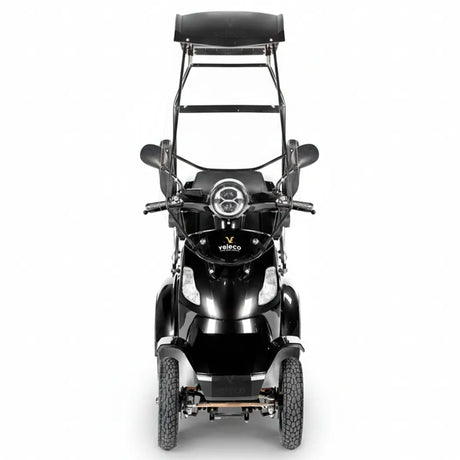 Vista frontal de scooter con techo mostrando el sistema de luces completo y espejos retrovisores dortomedical