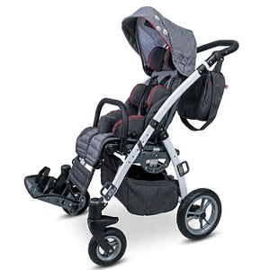 Modelo gris silla ortopédica infantil GRIZZLY con asiento desmontable y reversible para mayor versatilidad dortomedical