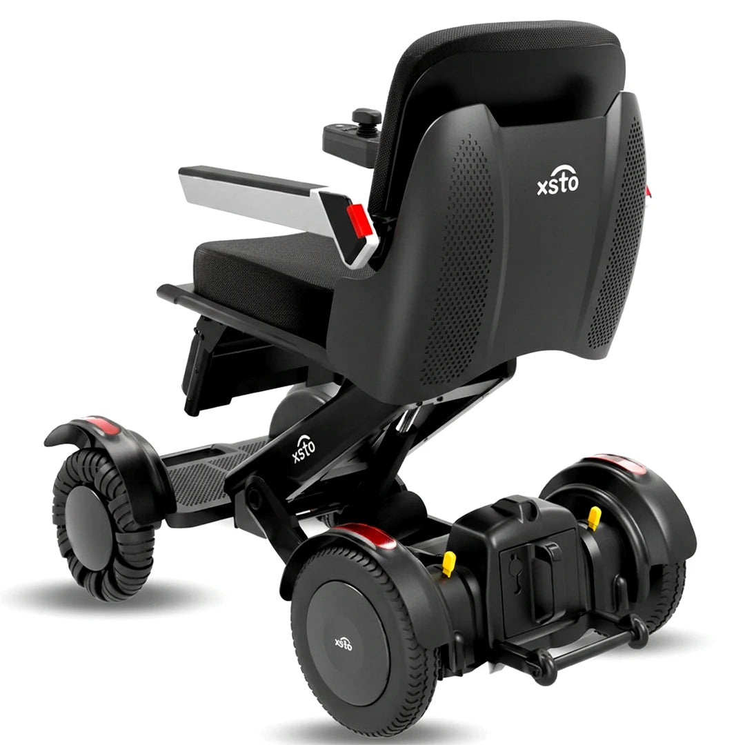 Vista trasera de la silla de ruedas motorizada con elevación de asiento para hablar cara a cara con otras personas dortomedical