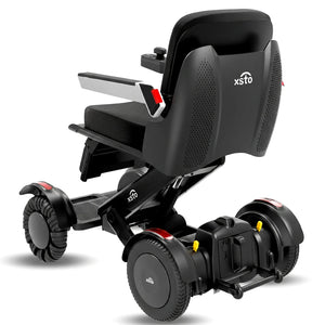 Vista trasera de la silla de ruedas motorizada con elevación de asiento para hablar cara a cara con otras personas dortomedical