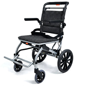 Silla de ruedas de traslado ultra ligera y plegable con estructura de aluminio que ofrece una seguridad total dortomedical
